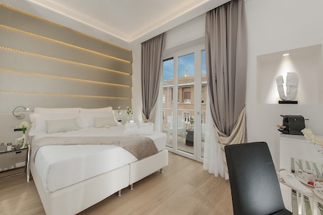 Premium bedding, memory foam beds, minibar, in-room safe