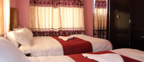 Family Triple Room, 1 Bedroom | Premium bedding, desk, soundproofing, free WiFi