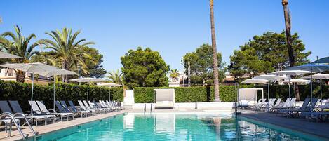 Outdoor pool, pool umbrellas, pool loungers