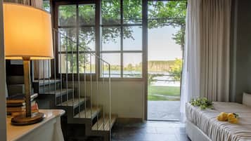 Suite, 2 camere da letto, vista lago | Minibar, una cassaforte in camera, una scrivania, insonorizzazione