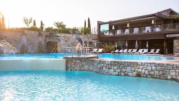 Seasonal outdoor pool, pool umbrellas, pool loungers