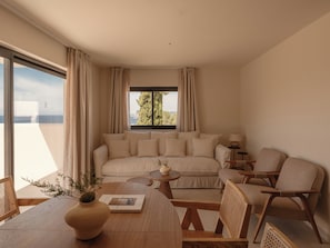 Deluxe Suite, Balcony, Sea View | Living area | Flat-screen TV - Besai Ibiza Boutique Hotel - New Opening (Sant Josep de sa Talaia)