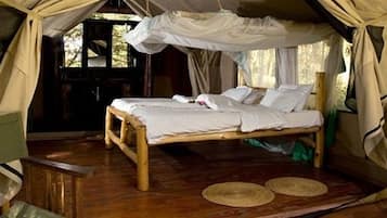 Deluxe Tent, Garden View | In-room safe, desk, bed sheets