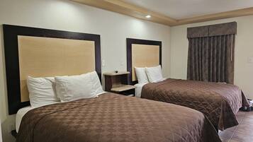 Deluxe Double Room, 2 Queen Beds | Desk, iron/ironing board, free WiFi, bed sheets