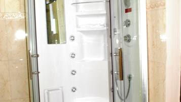 Shower, hair dryer, towels