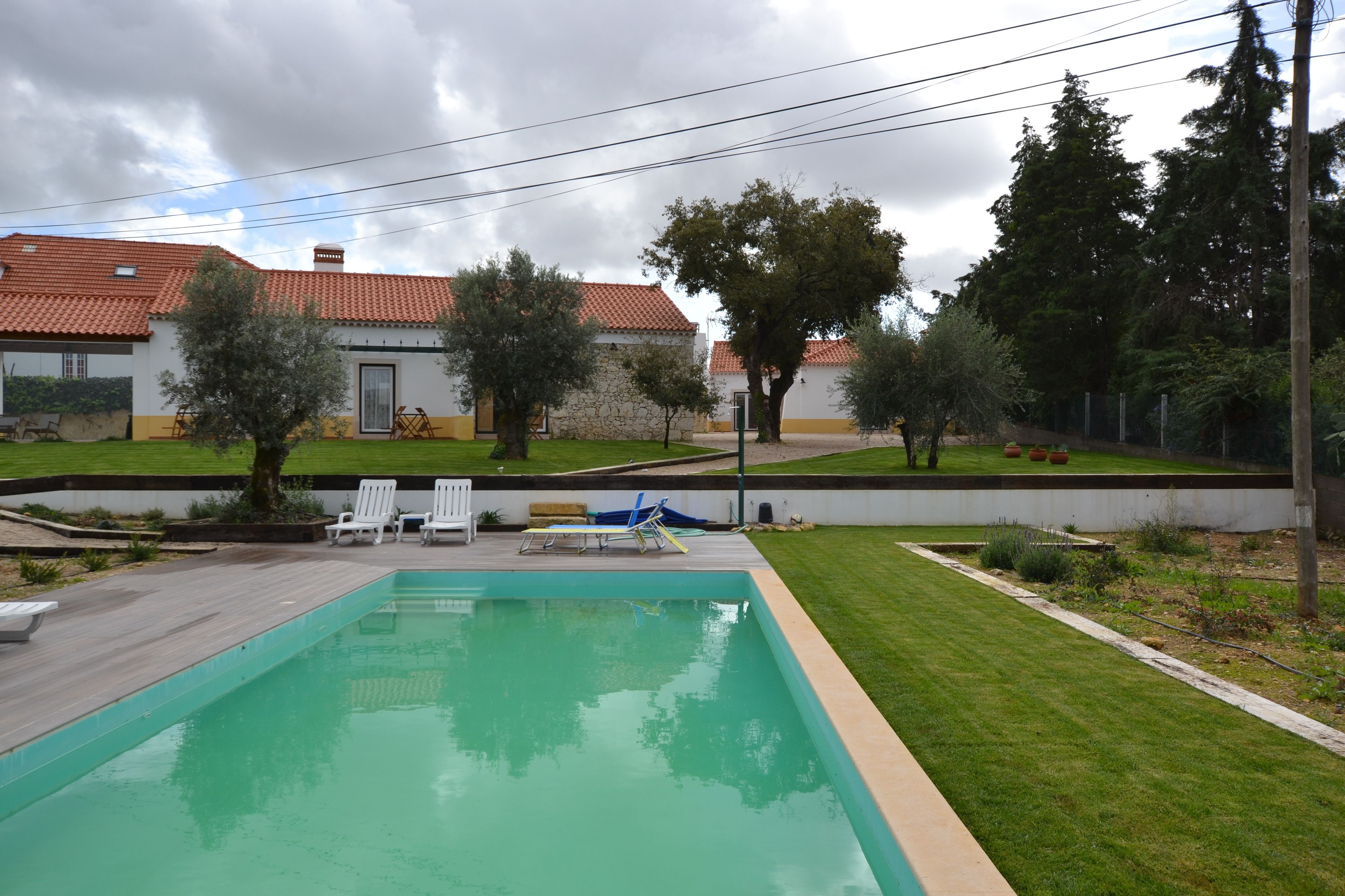 Outdoor pool, pool umbrellas, pool loungers