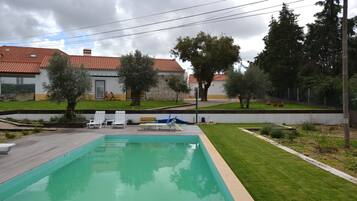 Outdoor pool, pool umbrellas, pool loungers