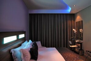 Sábanas de algodón egipcio, camas con pillow-top y minibar 