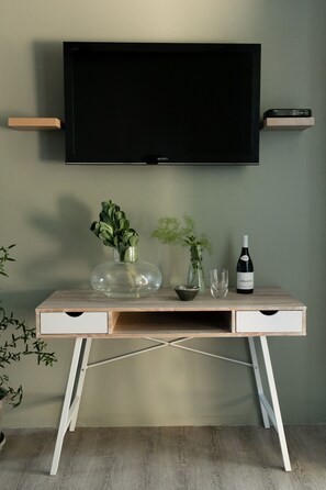 32-inch flat-screen TV with satellite channels, TV