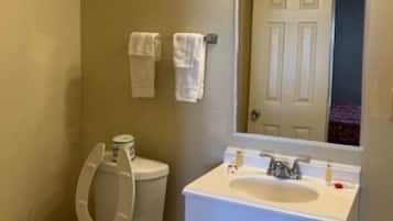 Shower, free toiletries, hair dryer