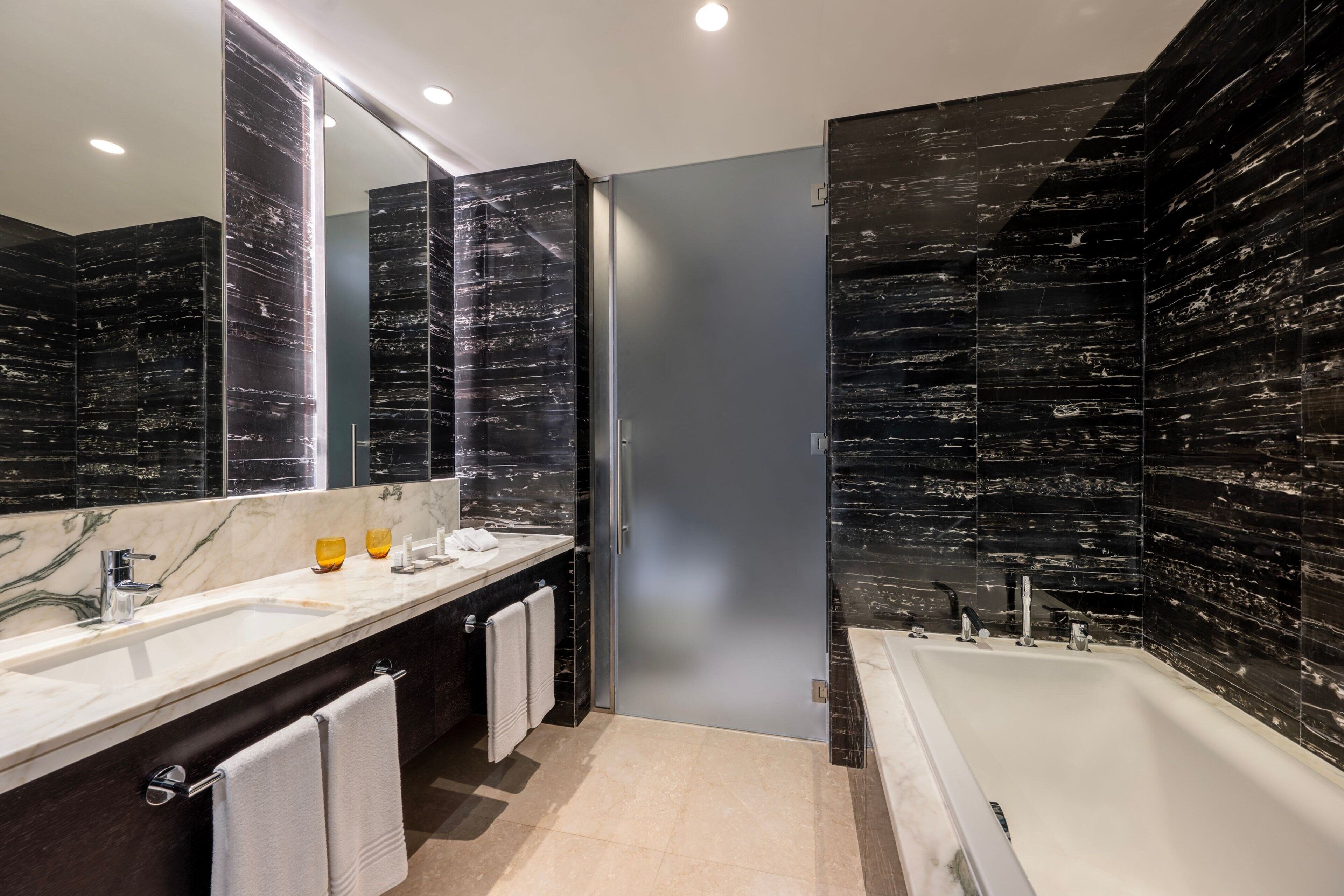 separate bathtub and shower, designer toiletries, hair dryer, bathrobes