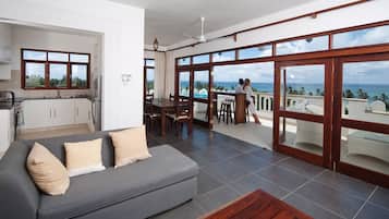 Penthouse, 1 Bedroom | Living area | TV
