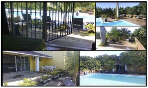 A pool area with a fenced patio, lounge chairs, and a small pool. - Casa Lilly B&B Cabarete (Cabarete)
