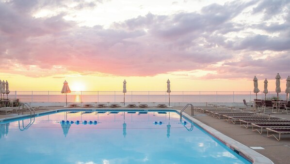 Seasonal outdoor pool, pool umbrellas, pool loungers