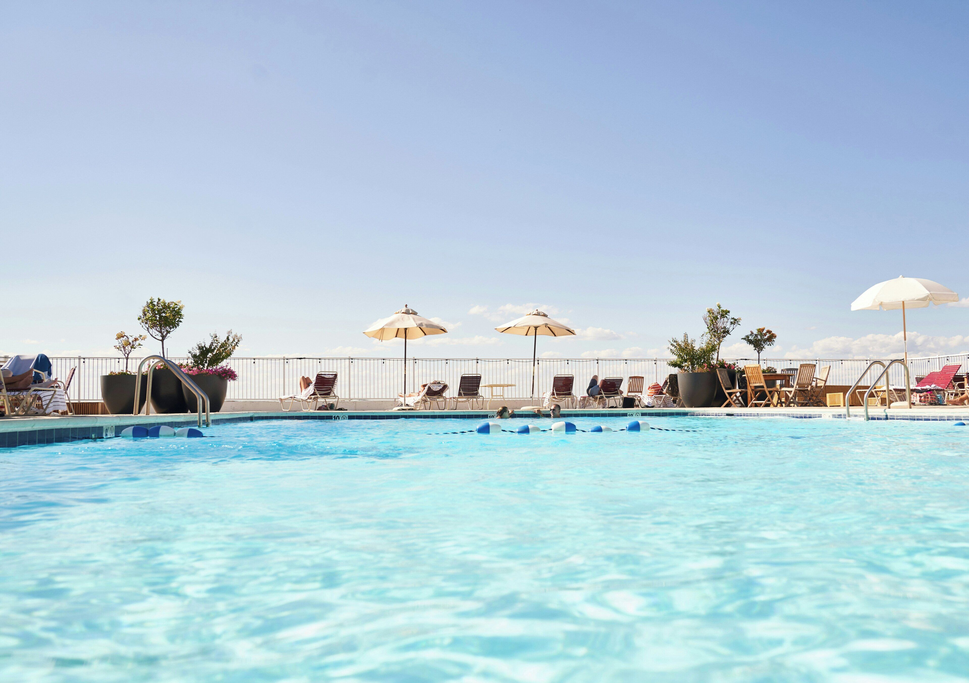 Seasonal outdoor pool, pool umbrellas, sun loungers