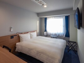 Desk, laptop workspace, free WiFi, bed sheets