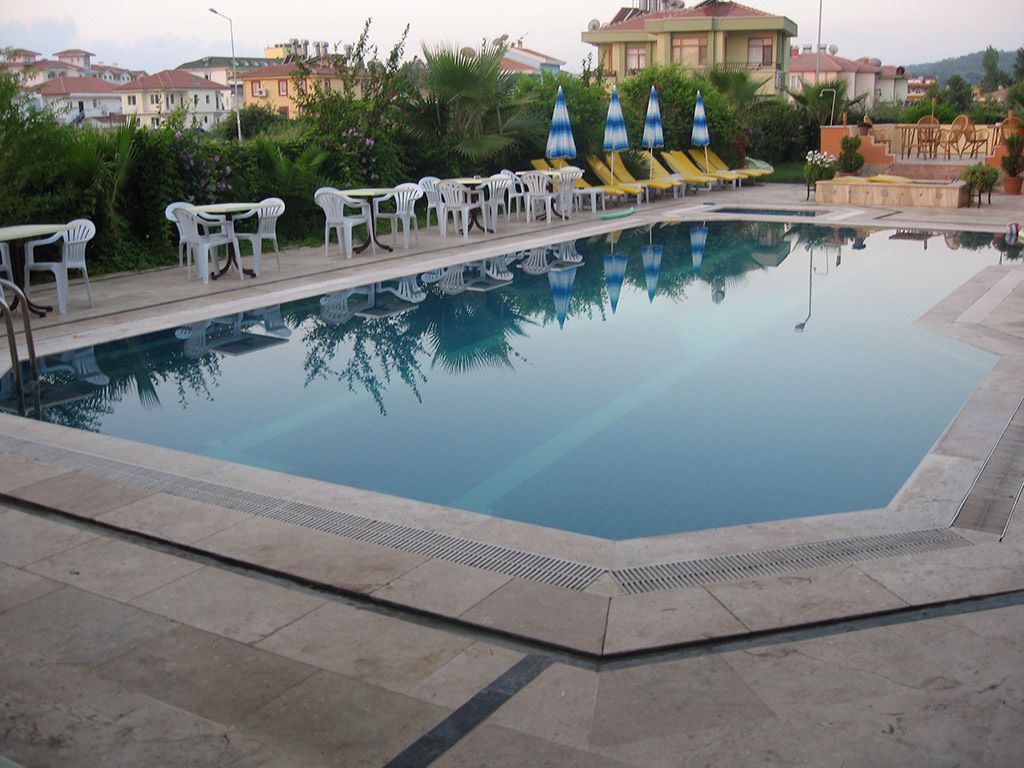 outdoor pool, pool umbrellas, pool loungers