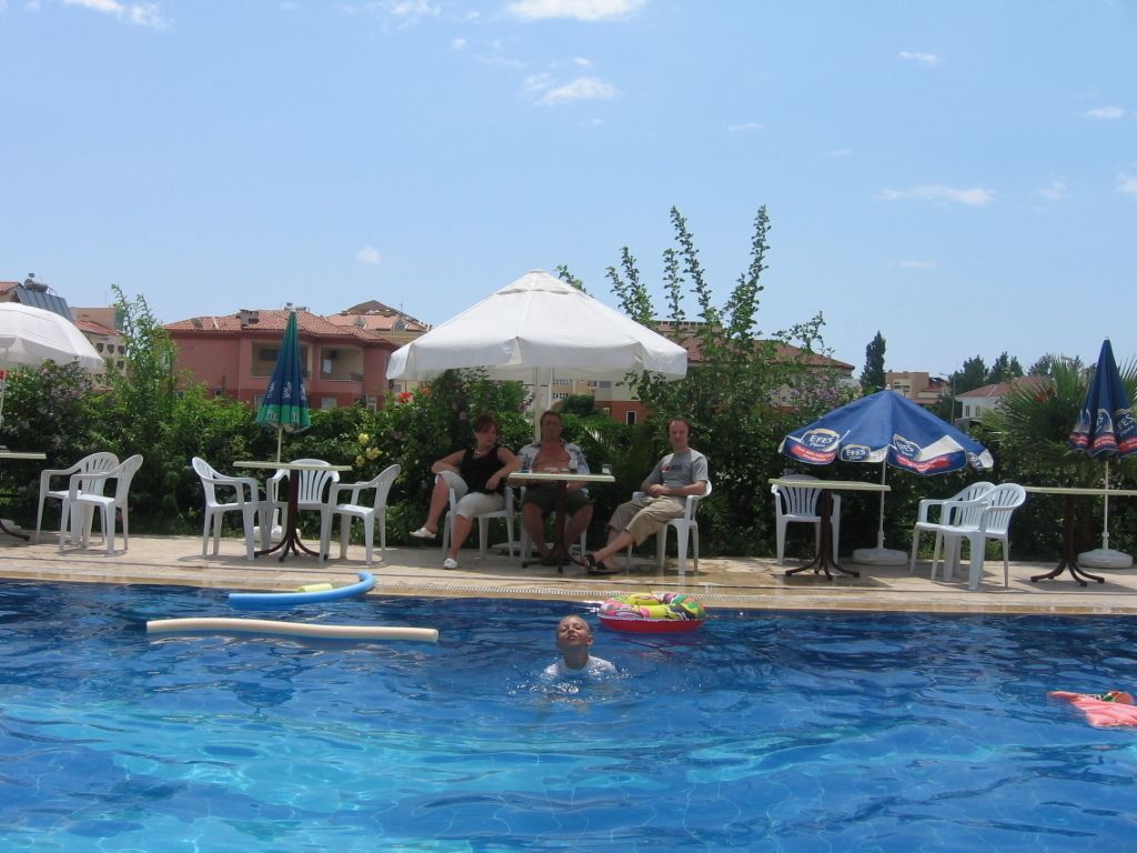 outdoor pool, pool umbrellas, pool loungers