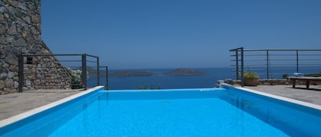 Outdoor pool, pool umbrellas, pool loungers