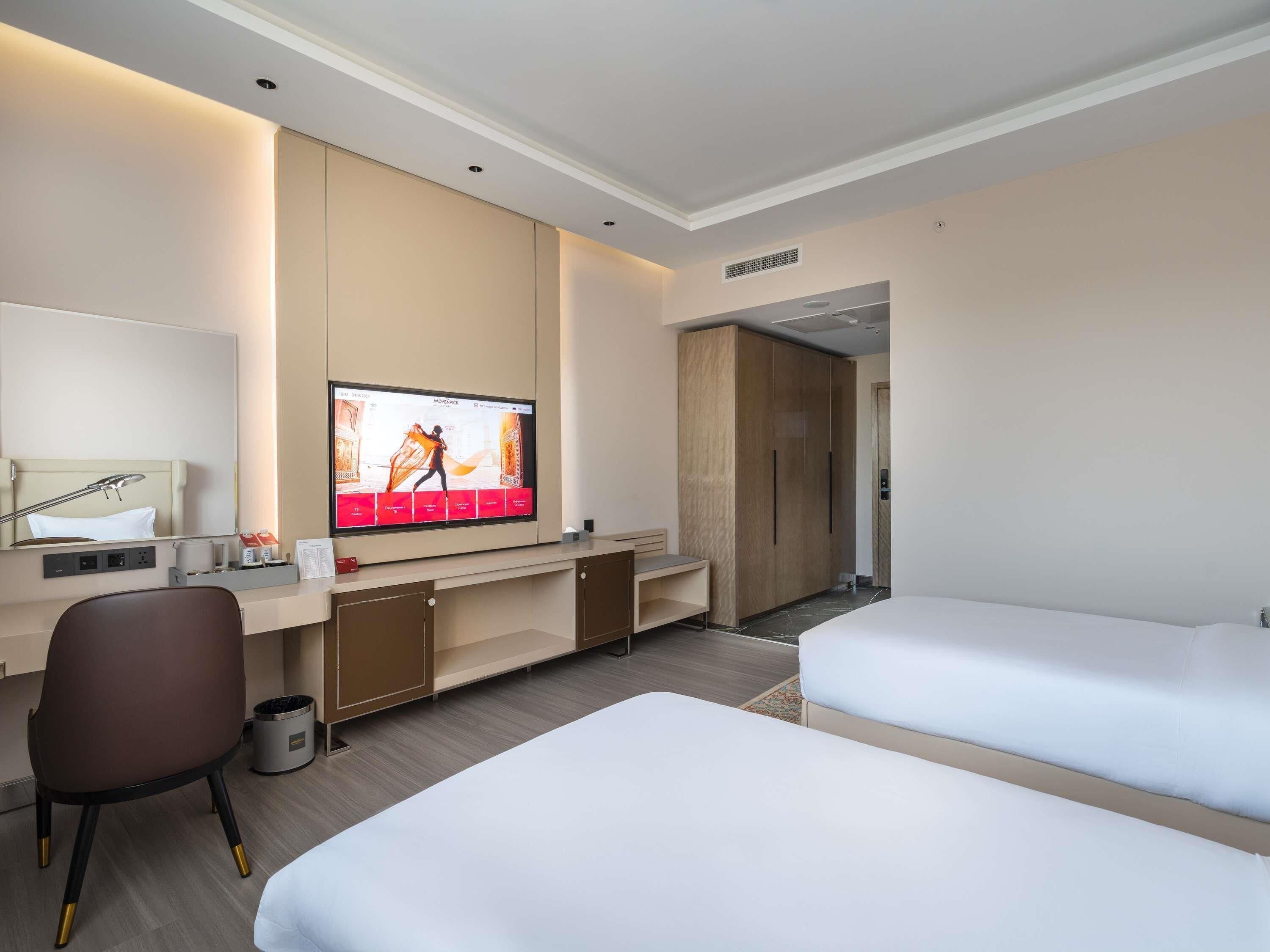 Habitación estándar, 2 camas individuales | Minibar, escritorio, tabla de planchar con plancha y cunas gratuitas