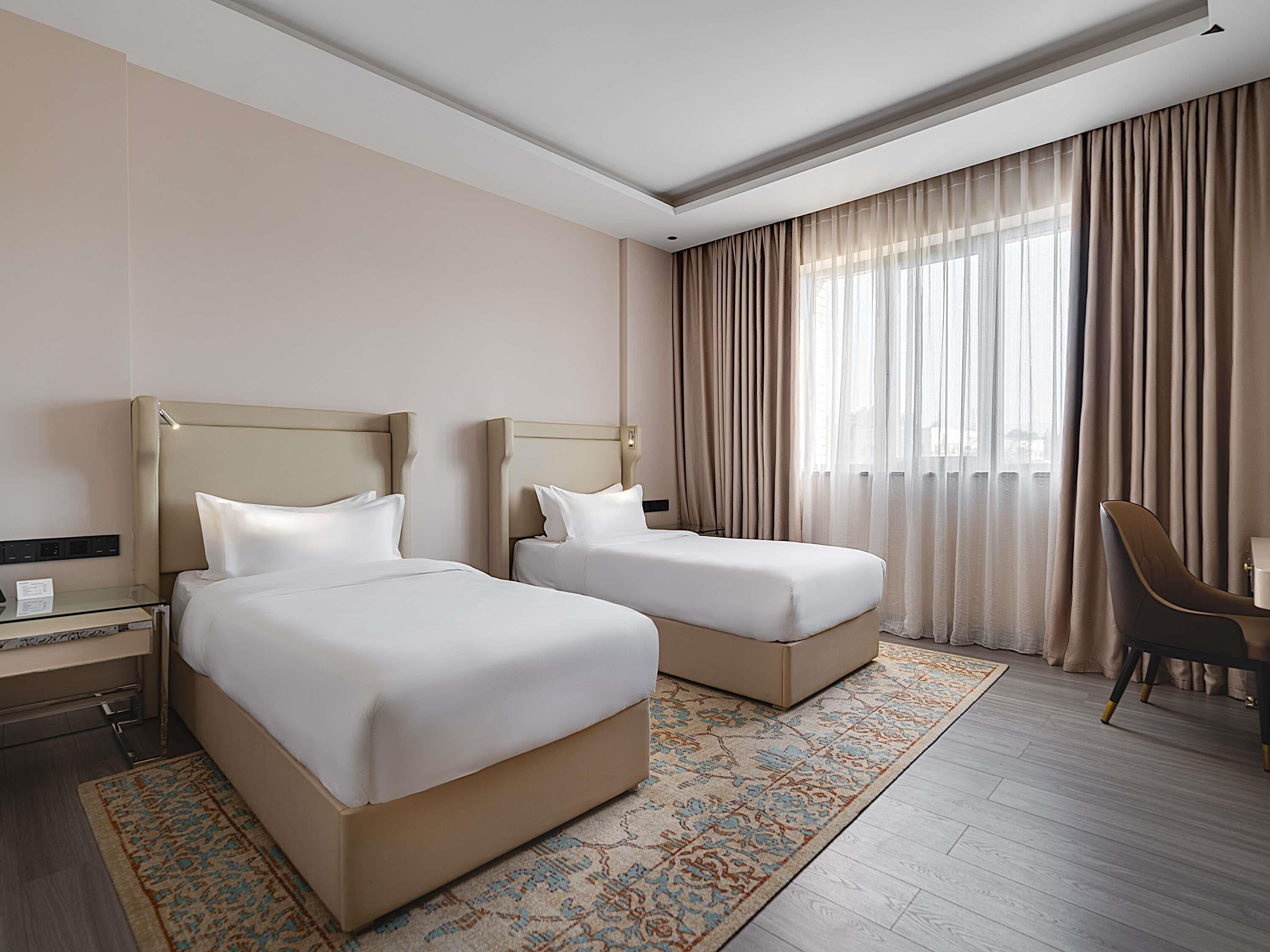 Standard Room, 2 Single Beds | Minibar, desk, iron/ironing board, free cots/infant beds
