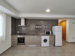 Superior Apartment, 2 Bedrooms | Private kitchen | Fridge, microwave, oven, stovetop