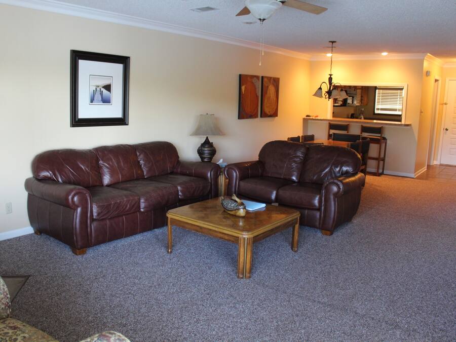 Apartamento Deluxe, 2 habitaciones | Zona de estar | Una televisión de pantalla plana, una chimenea