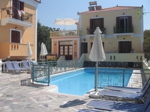 Outdoor pool, pool umbrellas, pool loungers