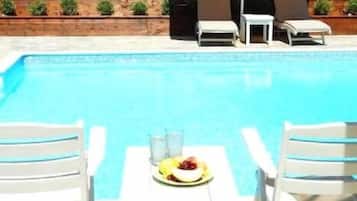 Outdoor pool, pool umbrellas, pool loungers