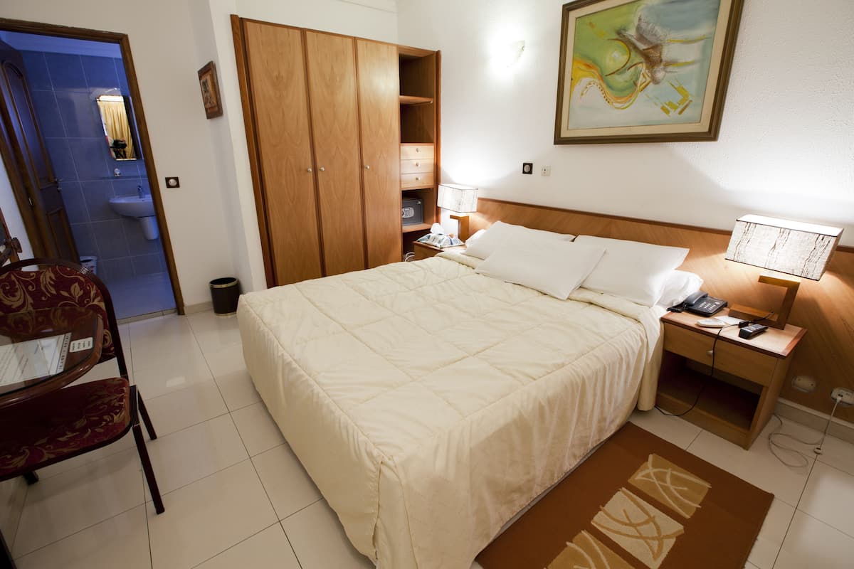 Biancheria da letto di alta qualità, una cassaforte in camera