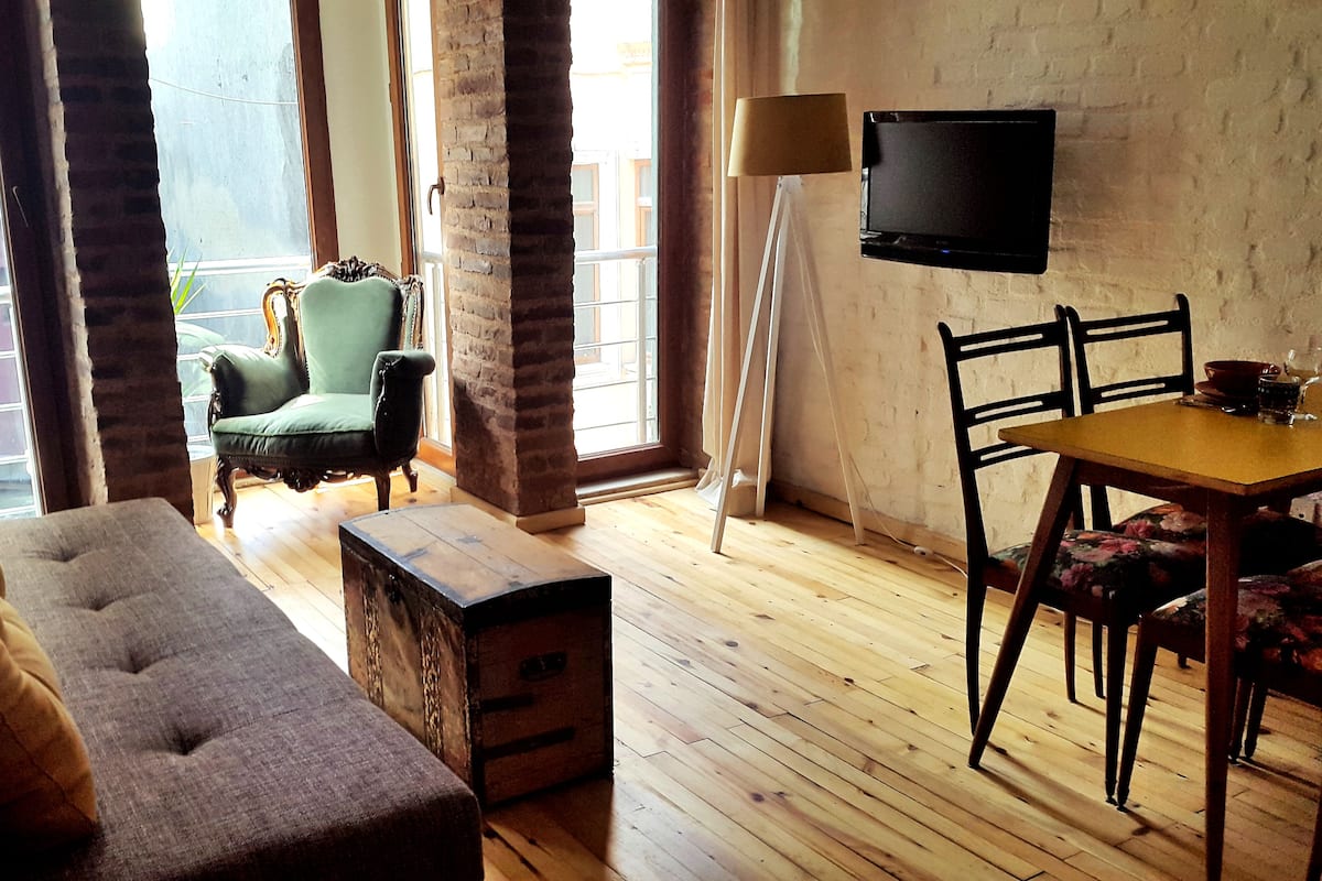 Apartment, 1 Bedroom | Living area | Flat-screen TV