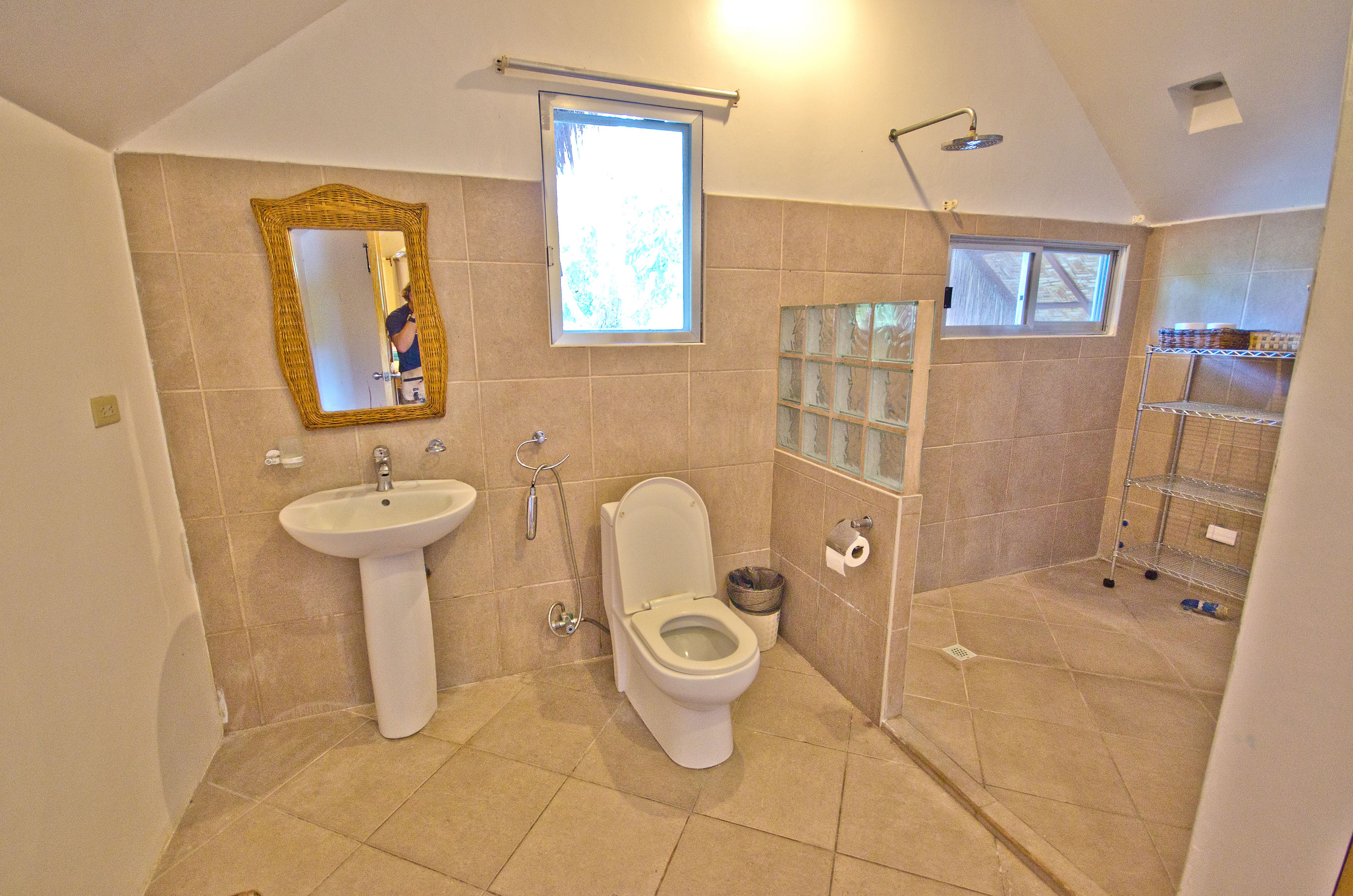 two-bedroom villa | bathroom | shower, free toiletries, hair dryer, towels