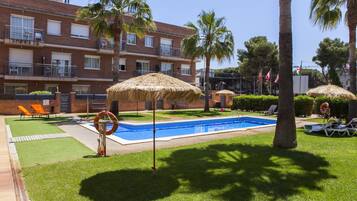 Outdoor pool, pool umbrellas, pool loungers
