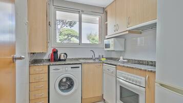 Appartamento, 1 camera da letto | Cucina privata | Frigorifero con congelatore, microonde, forno, piano cottura
