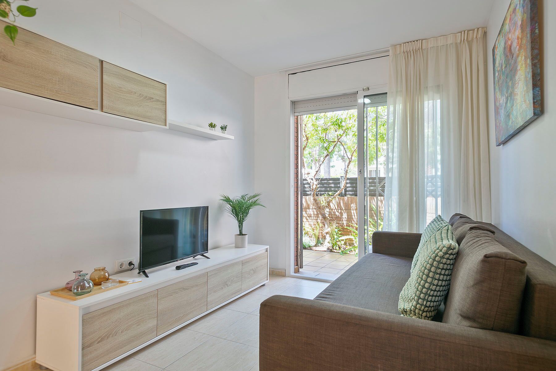 Apartamento, 2 habitaciones (5p) | Zona de estar | Una televisión de pantalla plana