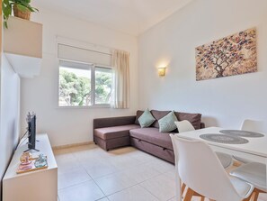 Apartment, 1 Bedroom | Living area | Flat-screen TV, ping pong