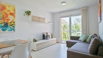 Apartment, 1 Bedroom | Living area | Flat-screen TV, table tennis