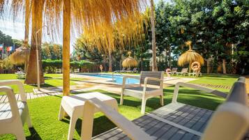 Outdoor pool, pool umbrellas, pool loungers