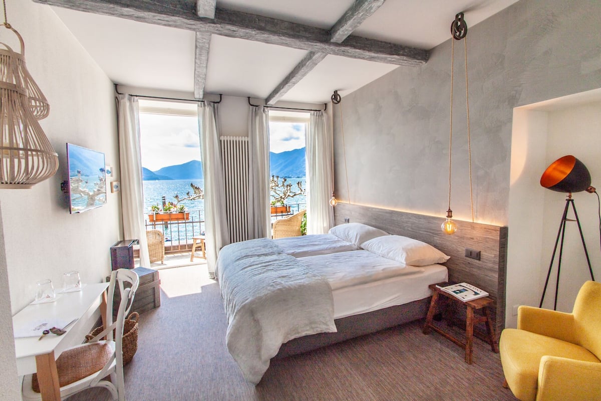 double room, lake view | 1 bedroom, in-room safe, individually decorated, individually furnished