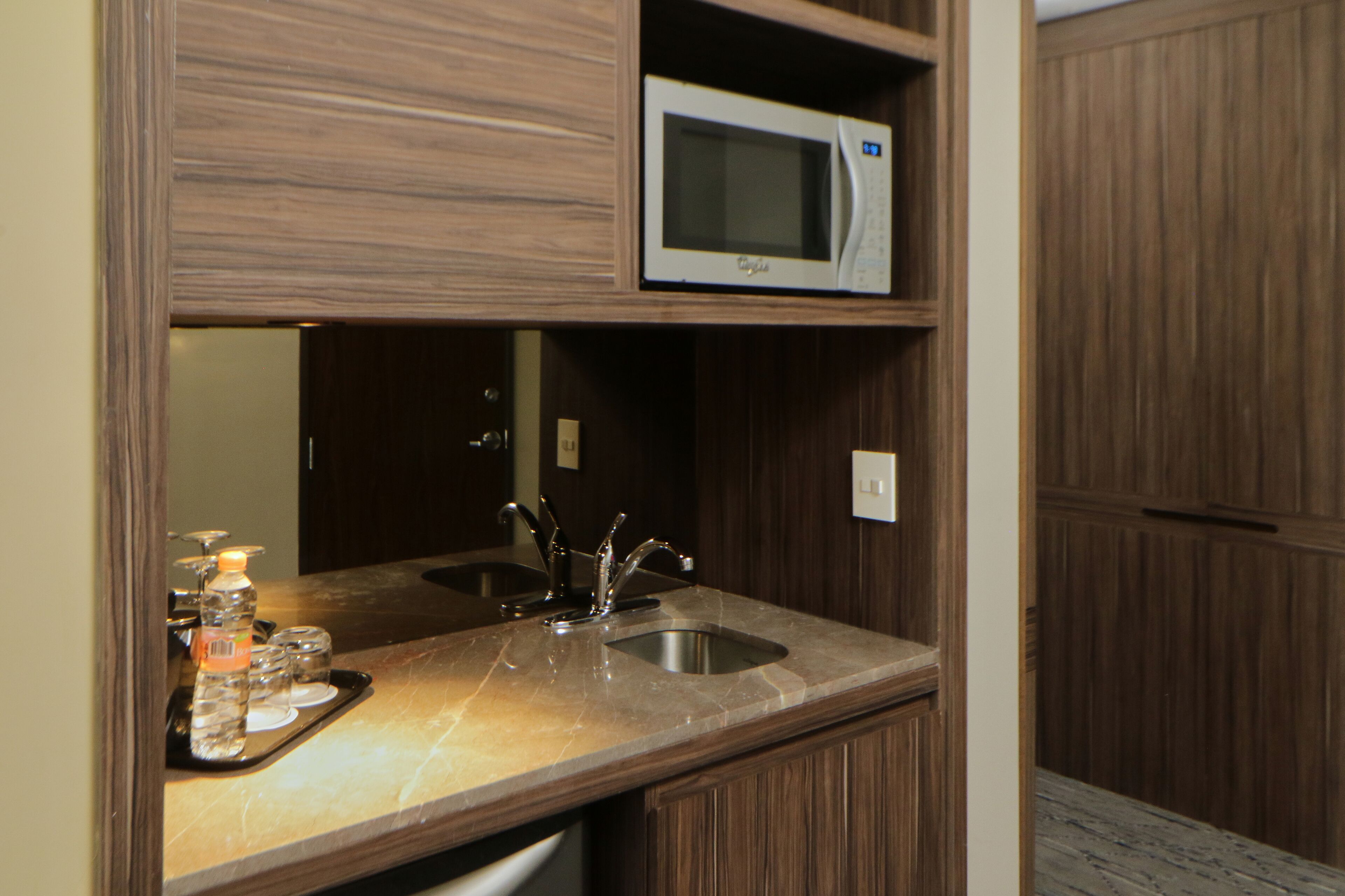 suite, 1 king bed with sofa bed | living area | flat-screen tv, ipod dock