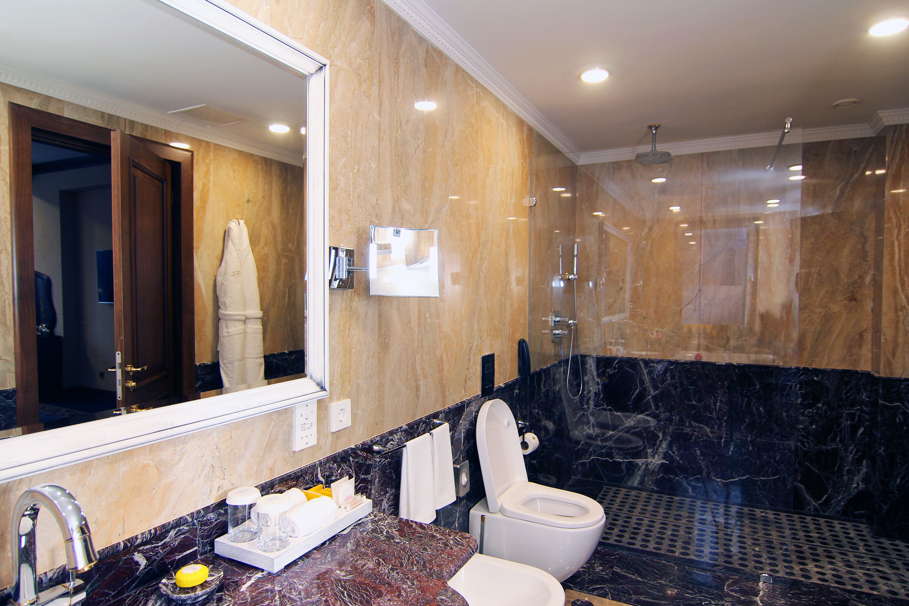 suite (orion) | bathroom | separate bathtub and shower, deep-soaking bathtub, rainfall showerhead