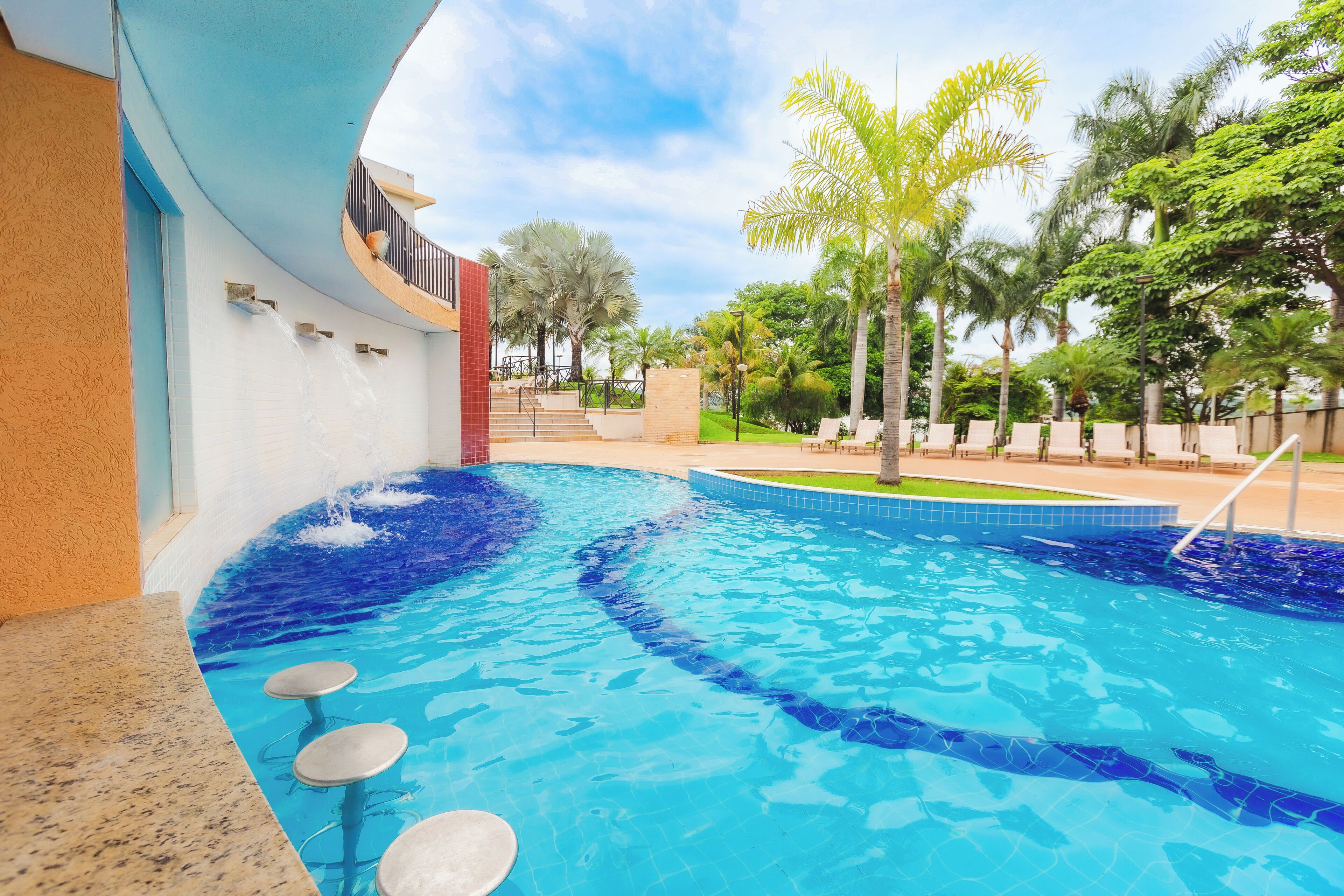 7 outdoor pools, pool umbrellas, pool loungers