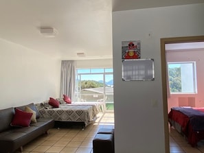 Apartment (Side View) | Individually decorated, blackout curtains, iron/ironing board, free WiFi - Residencial Via Praia (Florianópolis)
