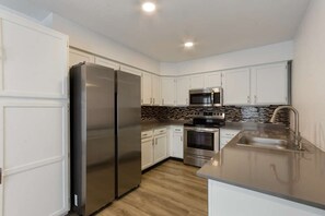 Mini-fridge, microwave, coffee/tea maker