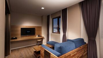 Premium bedding, down duvets, in-room safe, desk