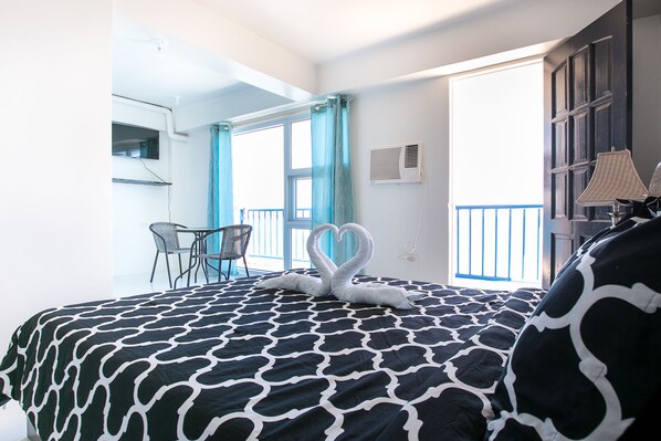 Egyptian cotton sheets, premium bedding, desk, laptop workspace