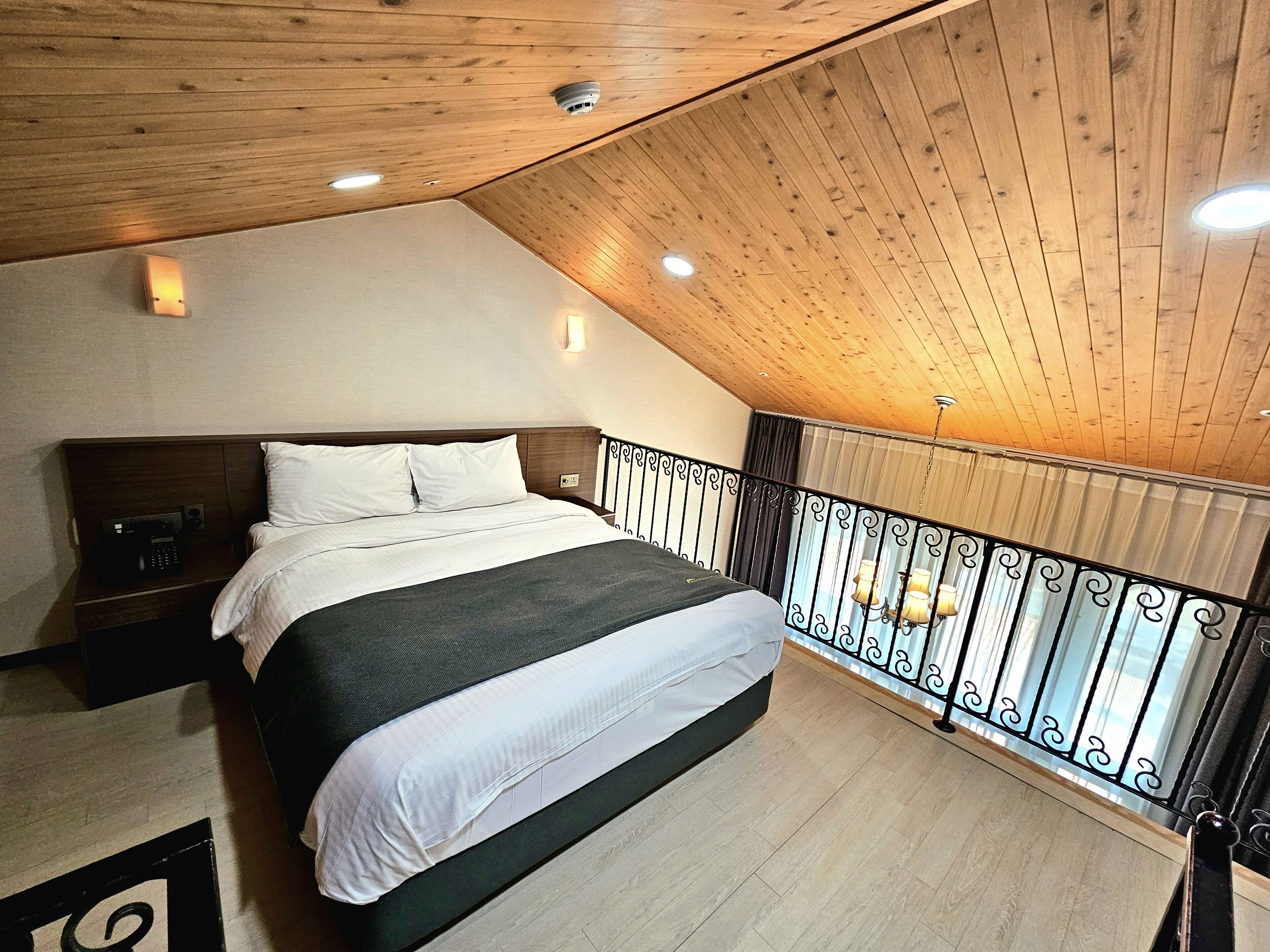 duplex (b - 1 double, 1 single, 1 futon) | living room | flat-screen tv