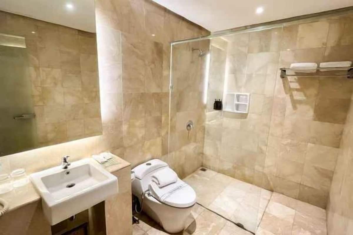 Bathroom | Shower, free toiletries, hair dryer, bathrobes