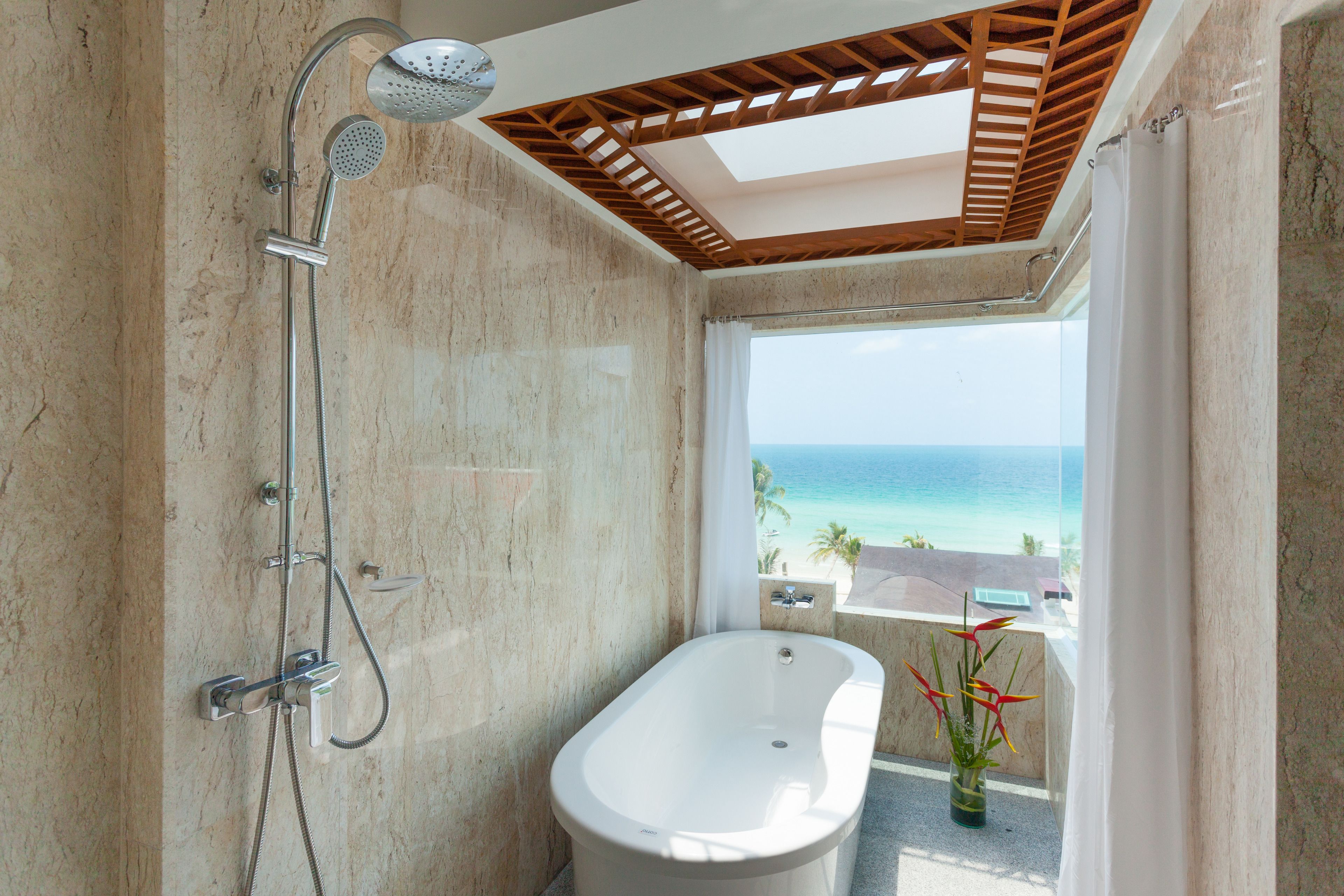 premium ocean facing room | bathroom | separate bathtub and shower, free toiletries, bidet, towels