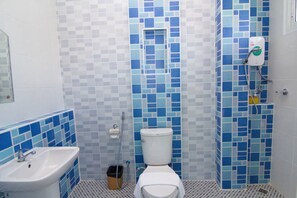 Shower, free toiletries, hair dryer, slippers